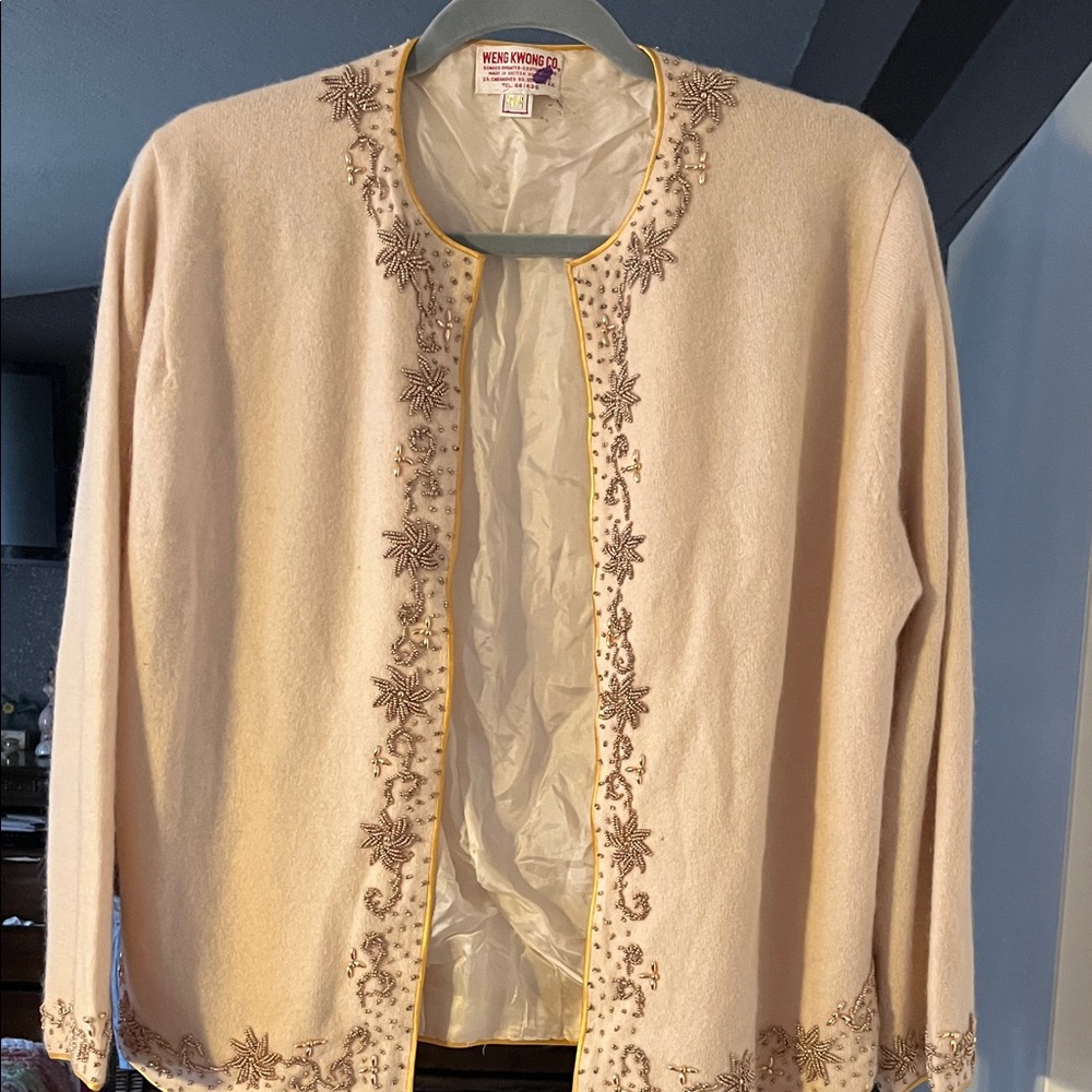 Vintage 1950s Embroidered Cream Cardigan
Collector peice